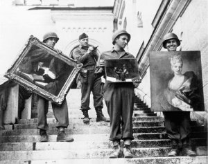 Second Lt. James J. Rorimer, second from left, supervising the recovery of paintings from Neuschwanstein Castle.