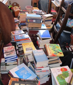 My books were moved to another room and piled knee-deep.